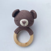 Hand-crocheted bear baby teething rattle with natural wood ring